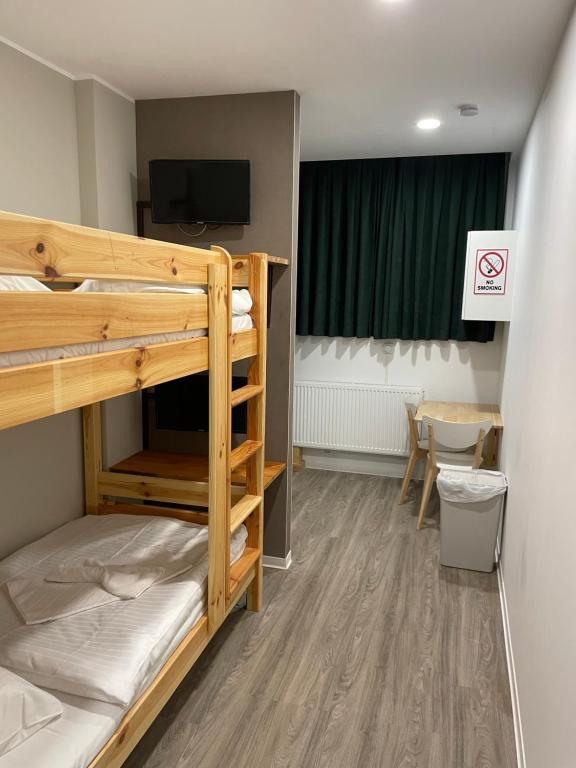 Postel nebo postele na pokoji v ubytování Hostel-Centrum