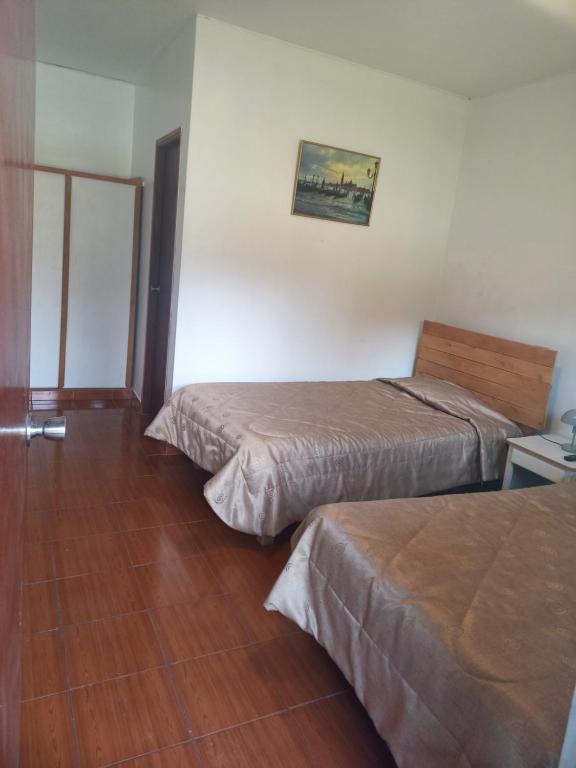 Postel nebo postele na pokoji v ubytování Hotel COMTUCAR