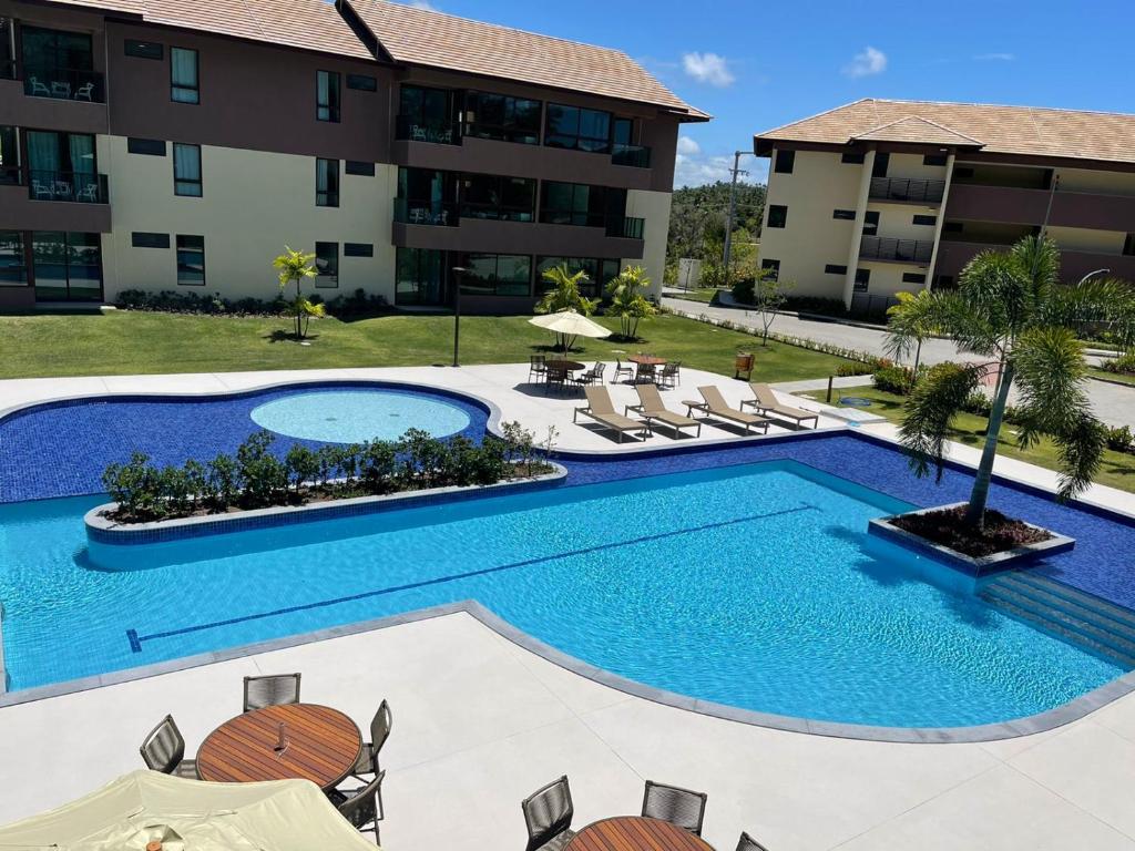 Πισίνα στο ή κοντά στο RESERVA CARNEIROS BEIRA MAR - BEACH RESORT- DELUX