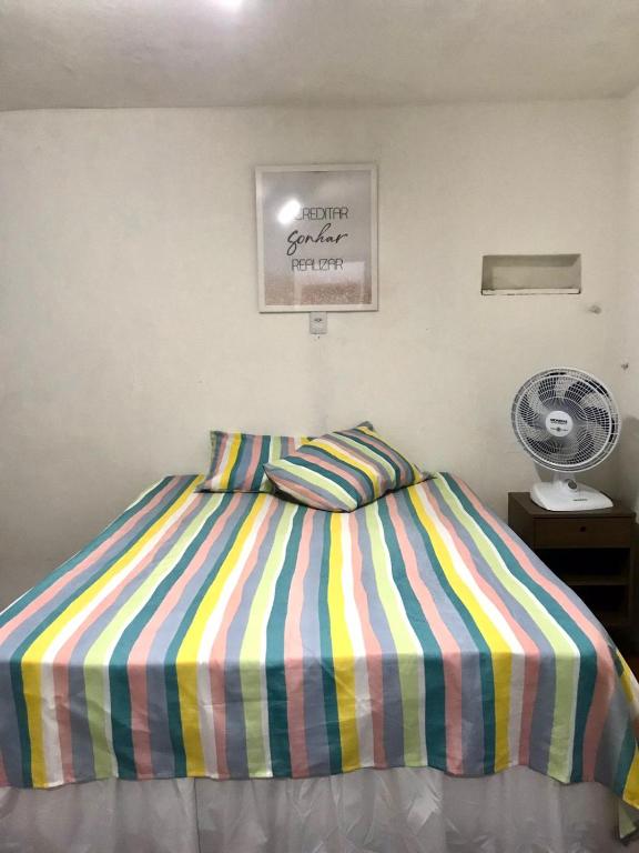 Postel nebo postele na pokoji v ubytování Pousada Cisne Branco