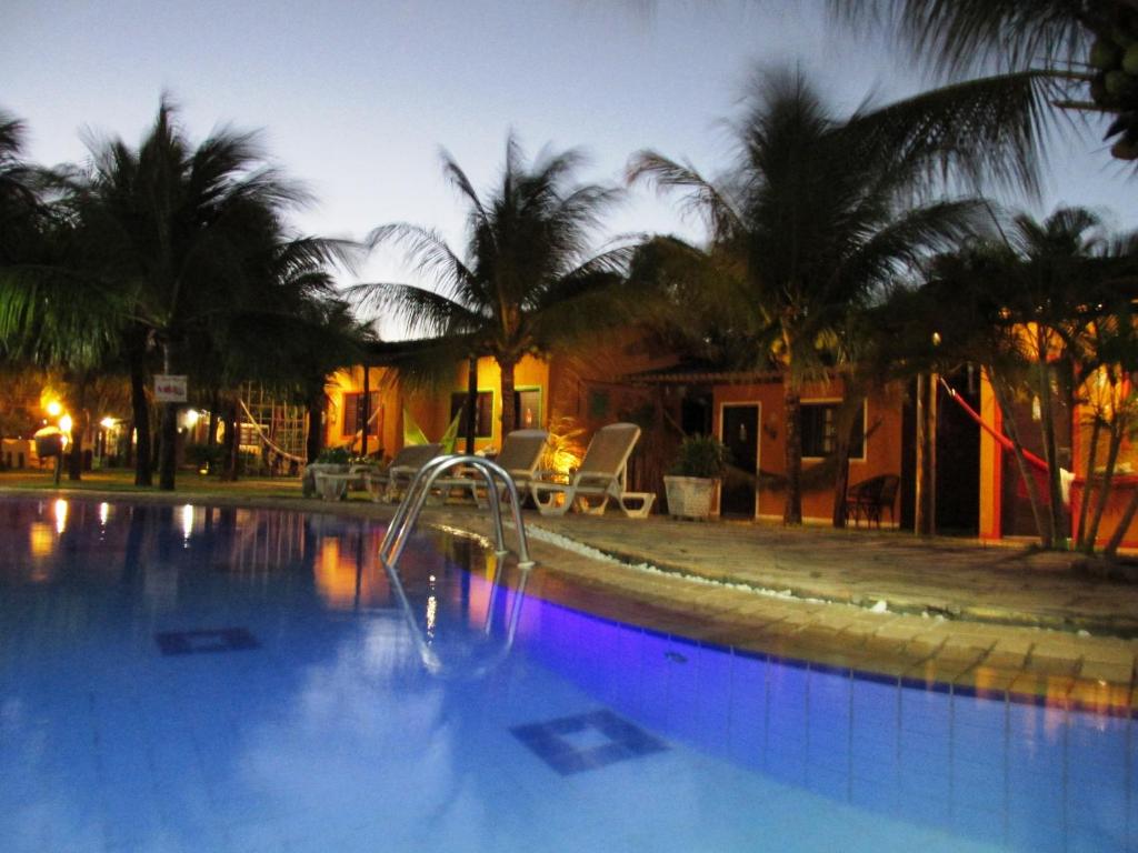 Piscina a Hotel Enseada Maracajaú o a prop