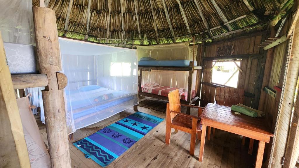Postel nebo postele na pokoji v ubytování Ecolodge Playa Brava Teyumakke