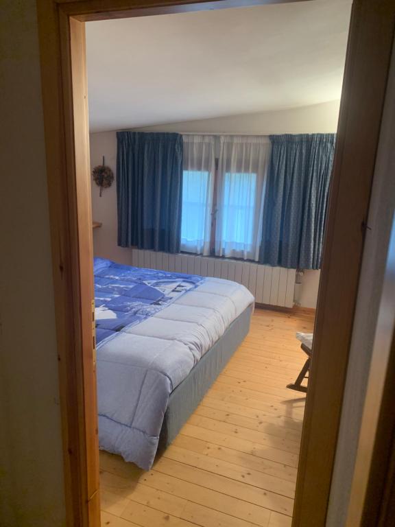 Postel nebo postele na pokoji v ubytování Incantevole 90MQ sulle piste di Limonetto