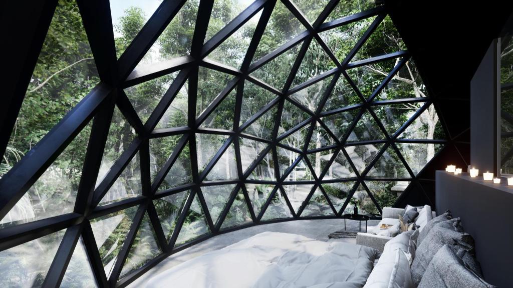 Fotografie z fotogalerie ubytování Glass House v destinaci Puerto Morelos