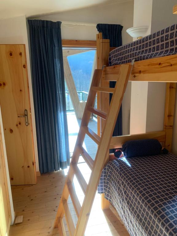 Postel nebo postele na pokoji v ubytování Incantevole 90MQ sulle piste di Limonetto