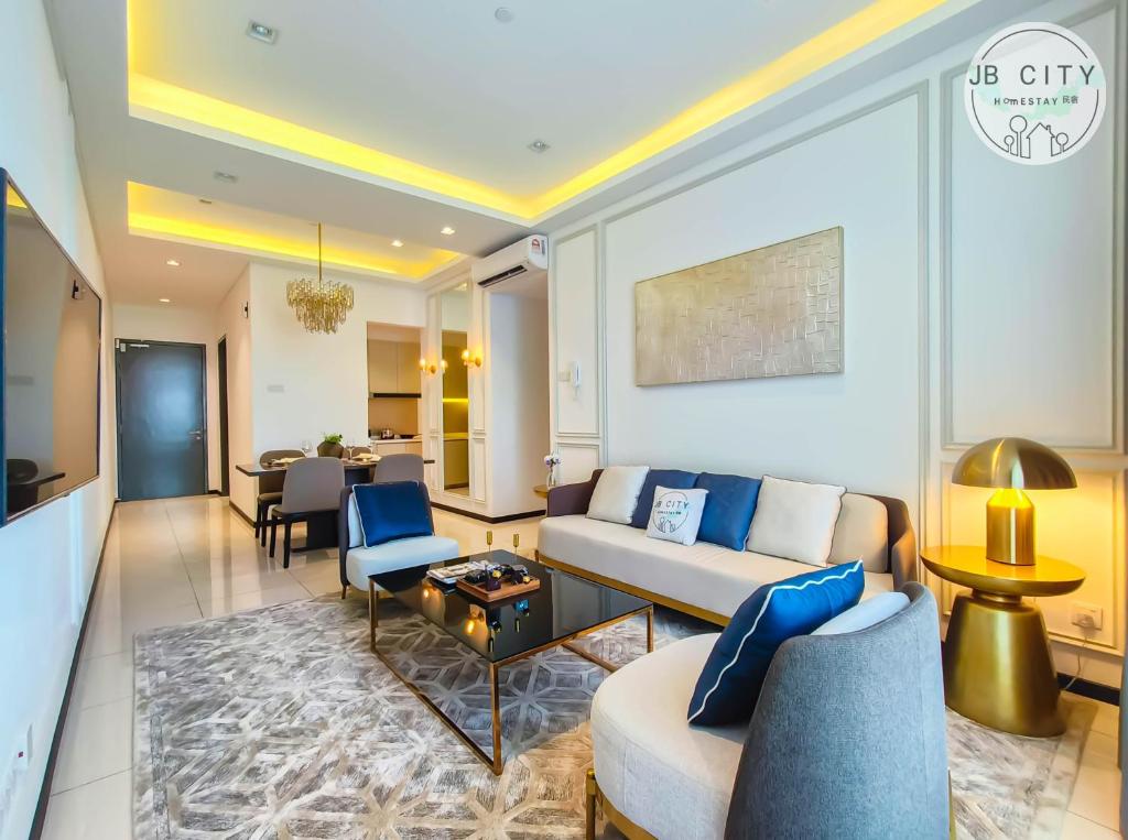 a living room with a couch and a table at Paradigm Residence by JBcity Home in Johor Bahru