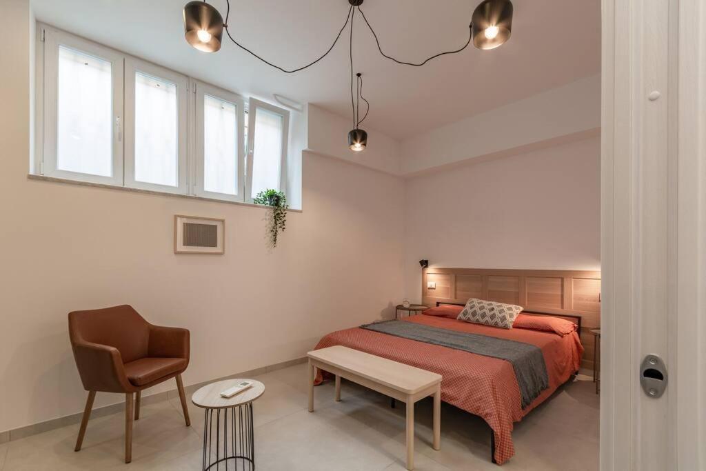 A bed or beds in a room at Battle Kitchen Loft