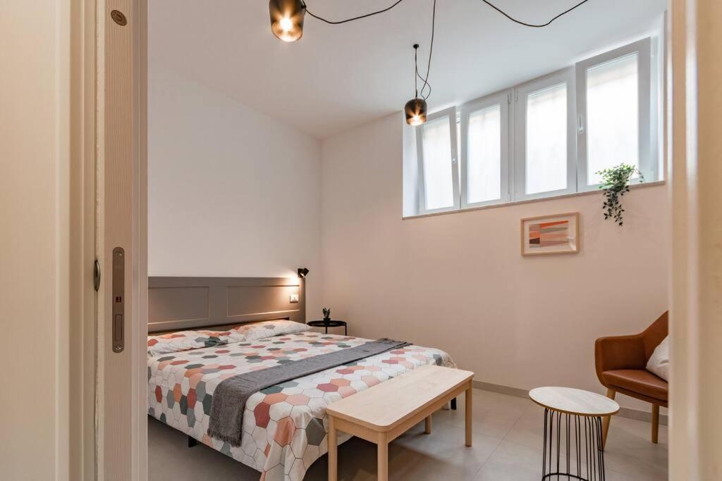 A bed or beds in a room at Battle Kitchen Loft