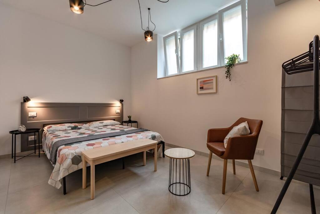 A bed or beds in a room at Battle Kitchen Loft