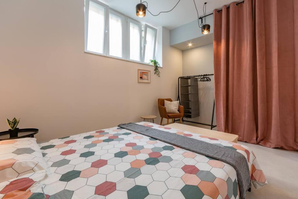 A bed or beds in a room at Battle Kitchen Loft