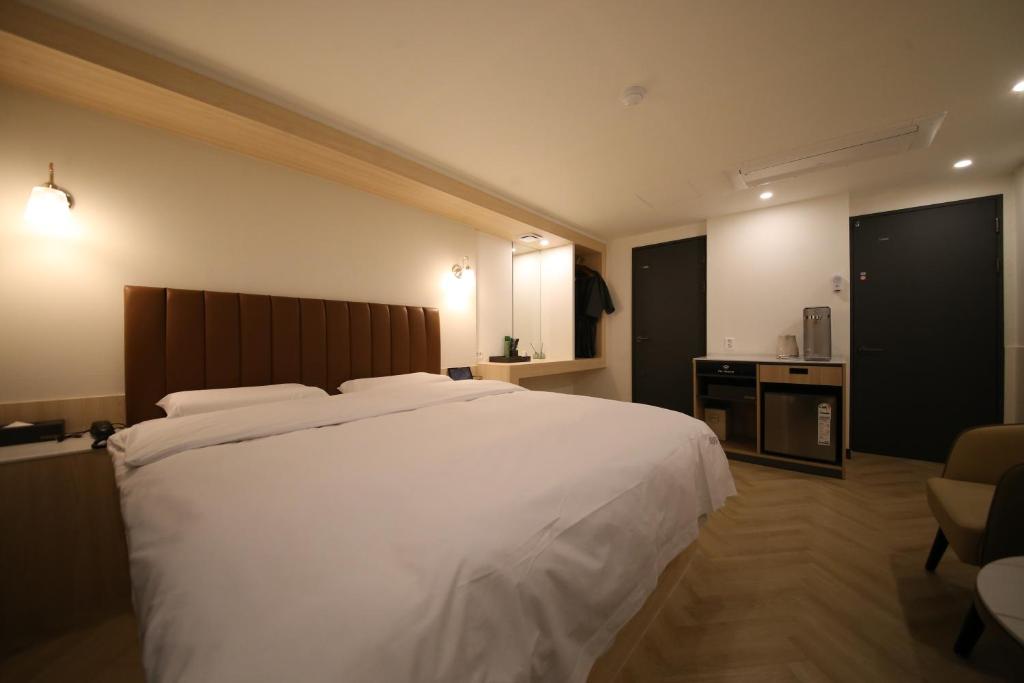 Postel nebo postele na pokoji v ubytování 25 Hotel