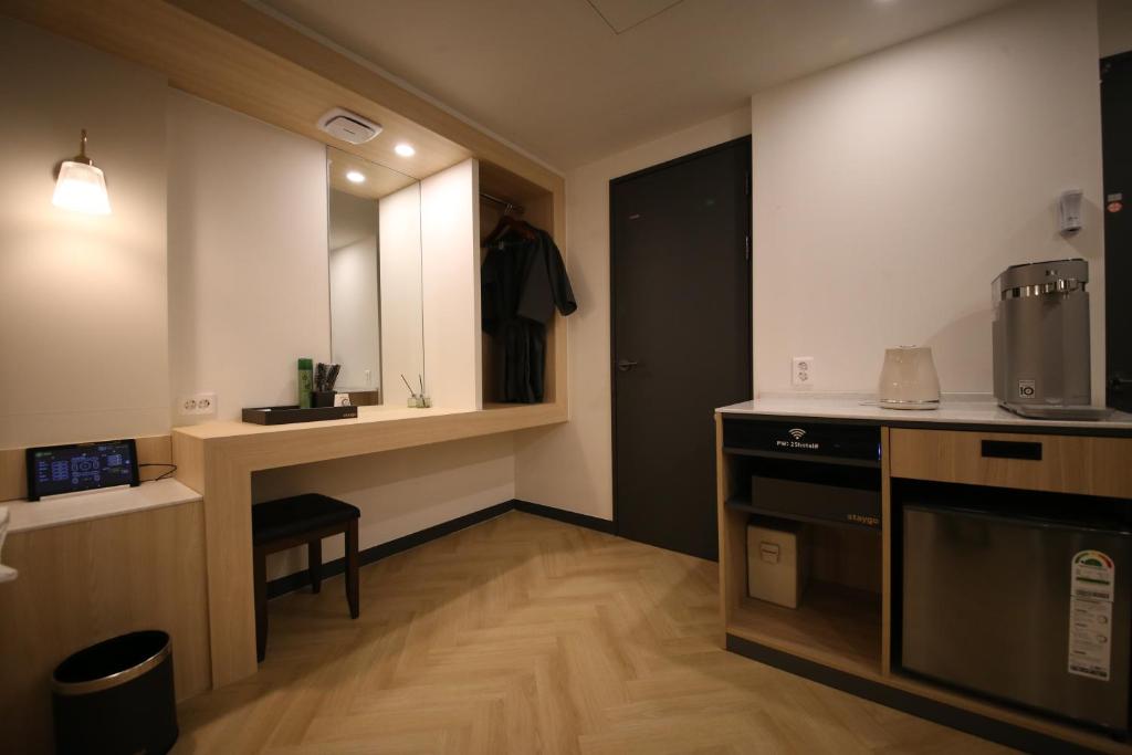 Kuchyň nebo kuchyňský kout v ubytování 25 Hotel