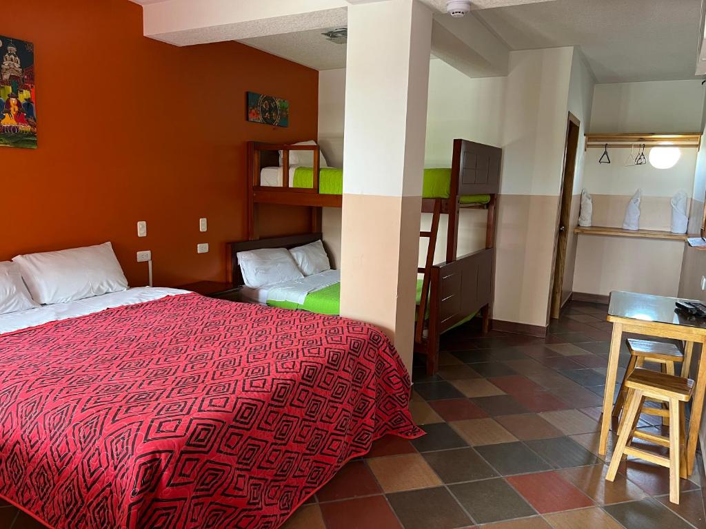 Postel nebo postele na pokoji v ubytování Hostal Alpachaca - New Quito Airport