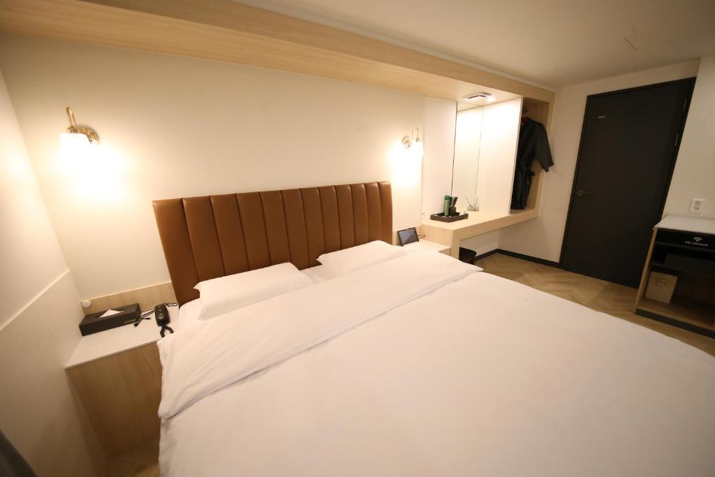 Postel nebo postele na pokoji v ubytování 25 Hotel
