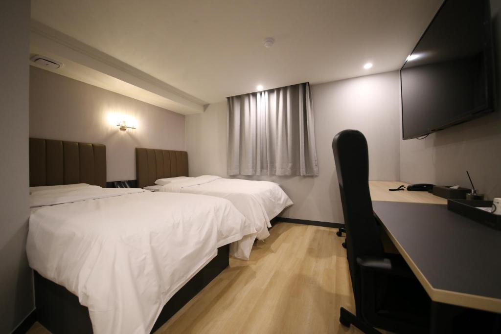Postel nebo postele na pokoji v ubytování 25 Hotel