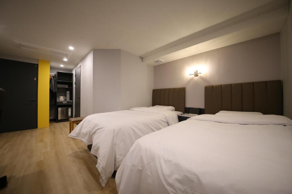Postel nebo postele na pokoji v ubytování 25 Hotel