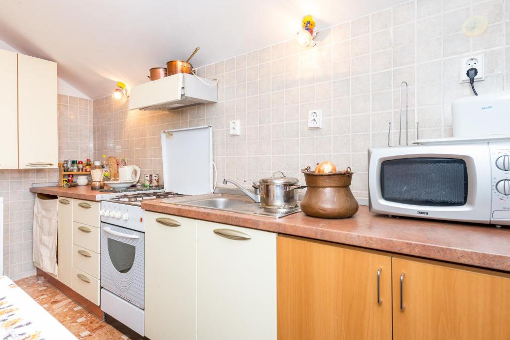 Kuchyňa alebo kuchynka v ubytovaní Apartment XXL Rio