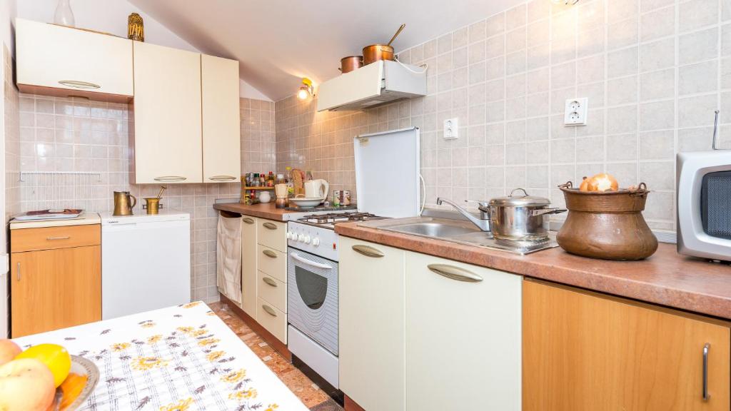 Kuchyňa alebo kuchynka v ubytovaní Apartment XXL Rio
