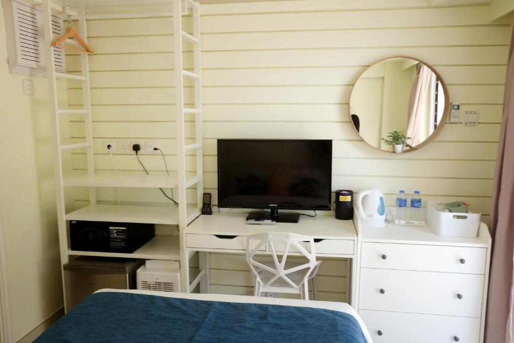 TV a/nebo společenská místnost v ubytování Bellagio Pets Friendly Resort