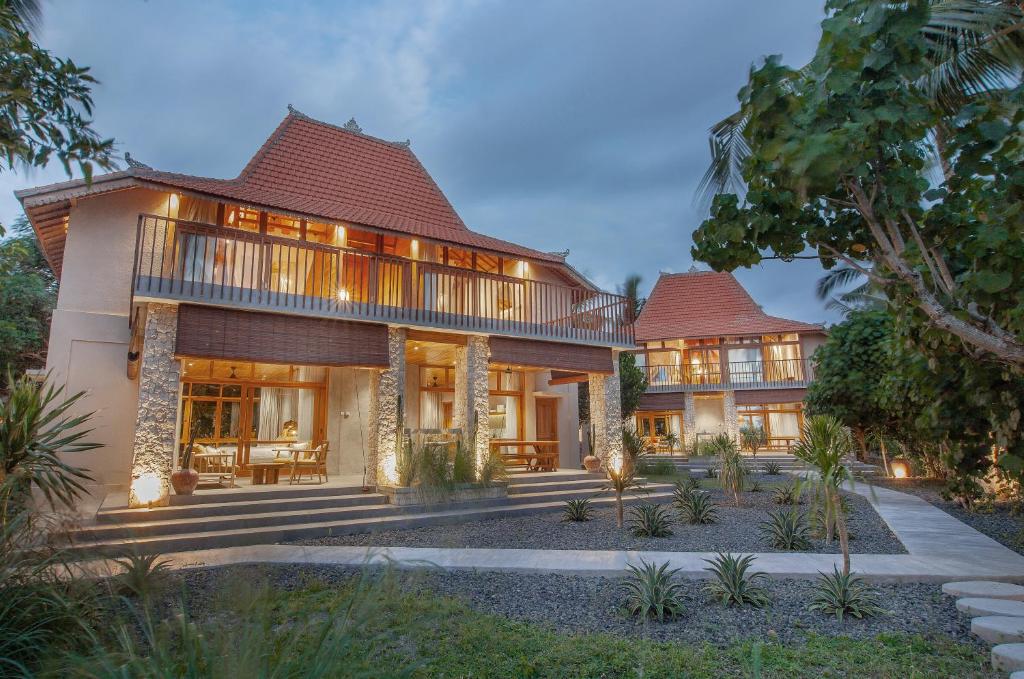 an image of a house with a building at Diamond Beach Villas in Nusa Penida