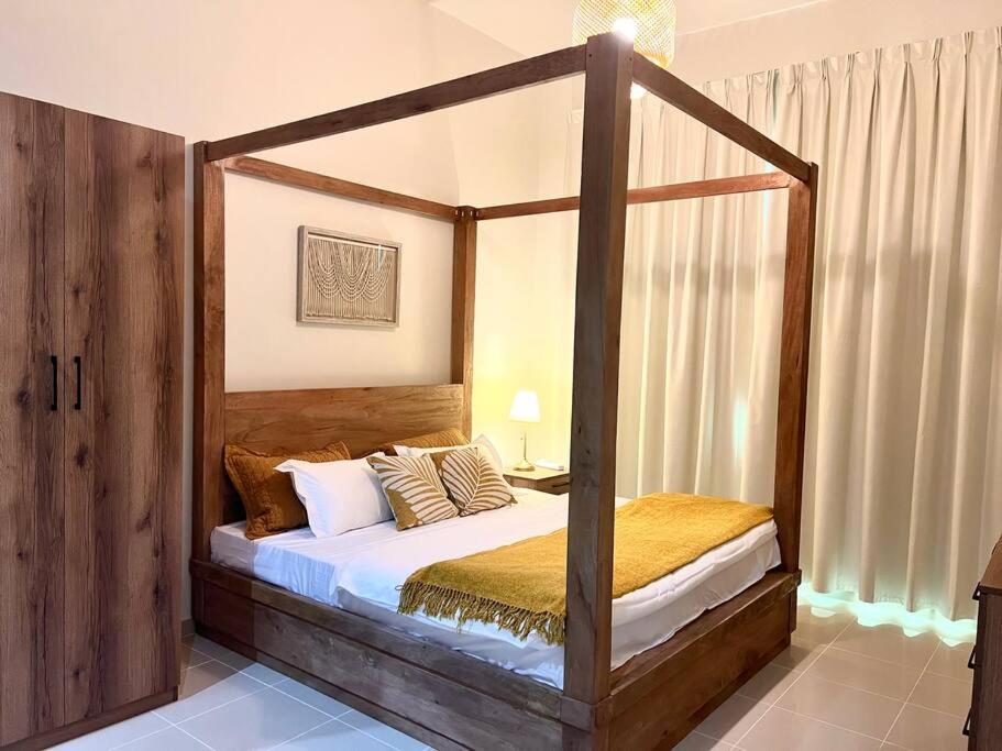 Giường trong phòng chung tại Calm&Cozy1BR- Dubai Silicon Oasis-15min-Dxb airpt