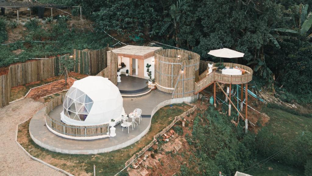 an aerial view of a playground with a house at Skypruek Luu Hlee ลุฮลี in Mon Jam