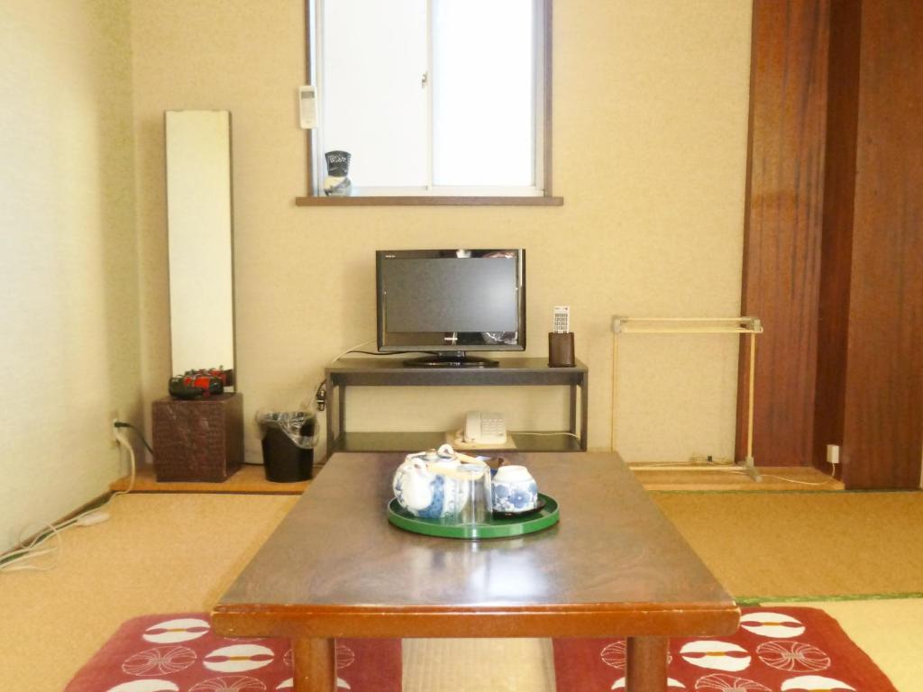 TV a/nebo společenská místnost v ubytování Imazato Ryokan
