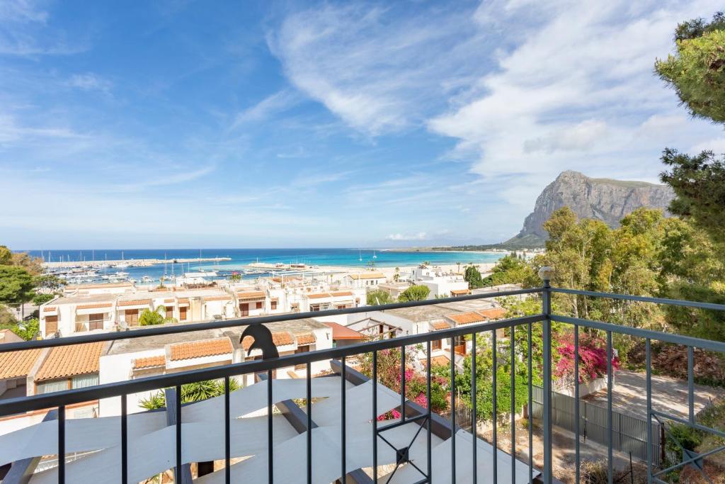 a balcony with a view of the ocean at Albergo Auralba in San Vito lo Capo