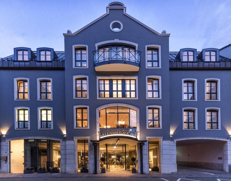 a large blue building with a lot of windows at Ravensberger Hof in Bielefeld