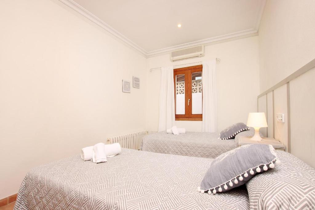 Postel nebo postele na pokoji v ubytování Villa PROVENZAL PETIT - PROVENZA