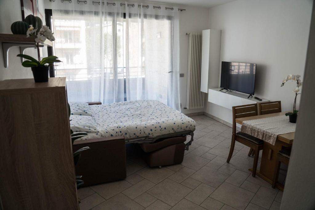 Ένα ή περισσότερα κρεβάτια σε δωμάτιο στο Casa Ricky