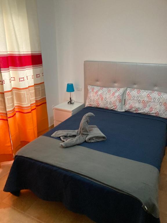 Posteľ alebo postele v izbe v ubytovaní MARTSARAs PLAYA SARDINA
