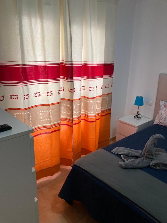 Posteľ alebo postele v izbe v ubytovaní MARTSARAs PLAYA SARDINA