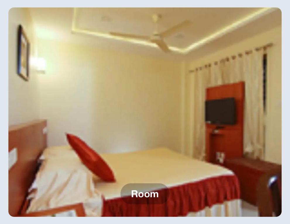 Voodi või voodid majutusasutuse Hotel Sasthapuri toas
