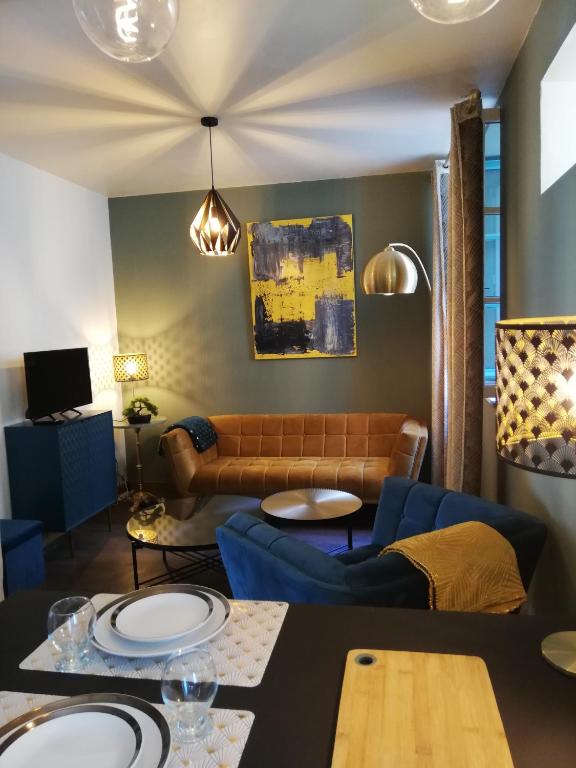 Posezení v ubytování Appartement sous les remparts