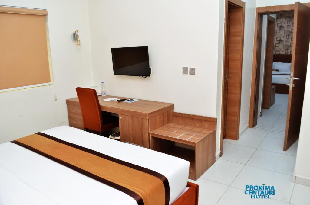 TV in/ali zabaviščno središče v nastanitvi Proxima Centauri Hotel