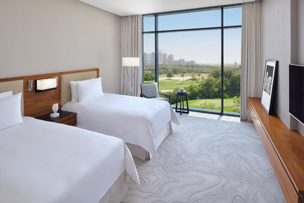 Voodi või voodid majutusasutuse Vida Emirates Hills toas