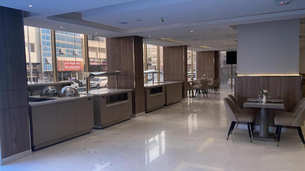 A seating area at Corp Executive Hotel Doha Suites