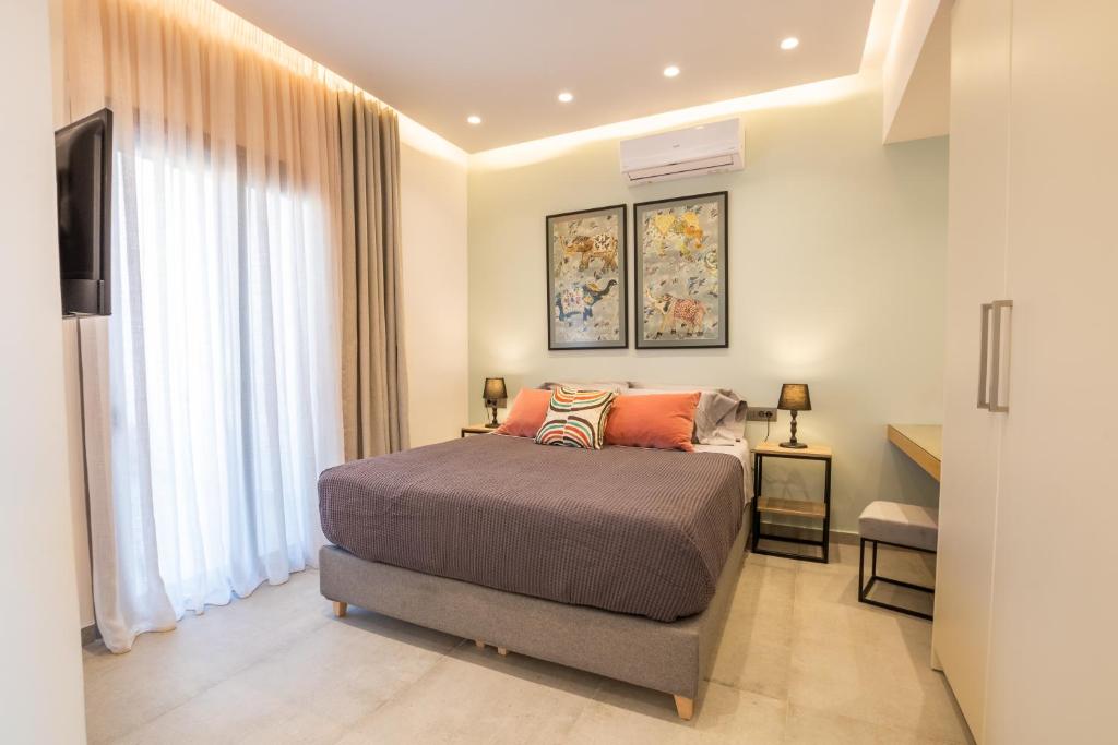 Posteľ alebo postele v izbe v ubytovaní Isanema Villas