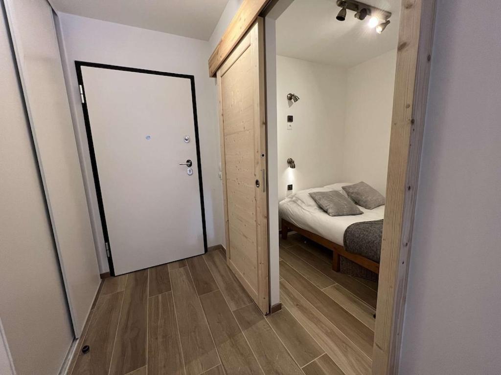 Posteľ alebo postele v izbe v ubytovaní LES FREINETS - Apt D02 - BO Immobilier - Châtel - Multipass été 2025 offert