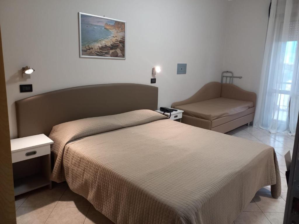 Postel nebo postele na pokoji v ubytování Hotel Susy