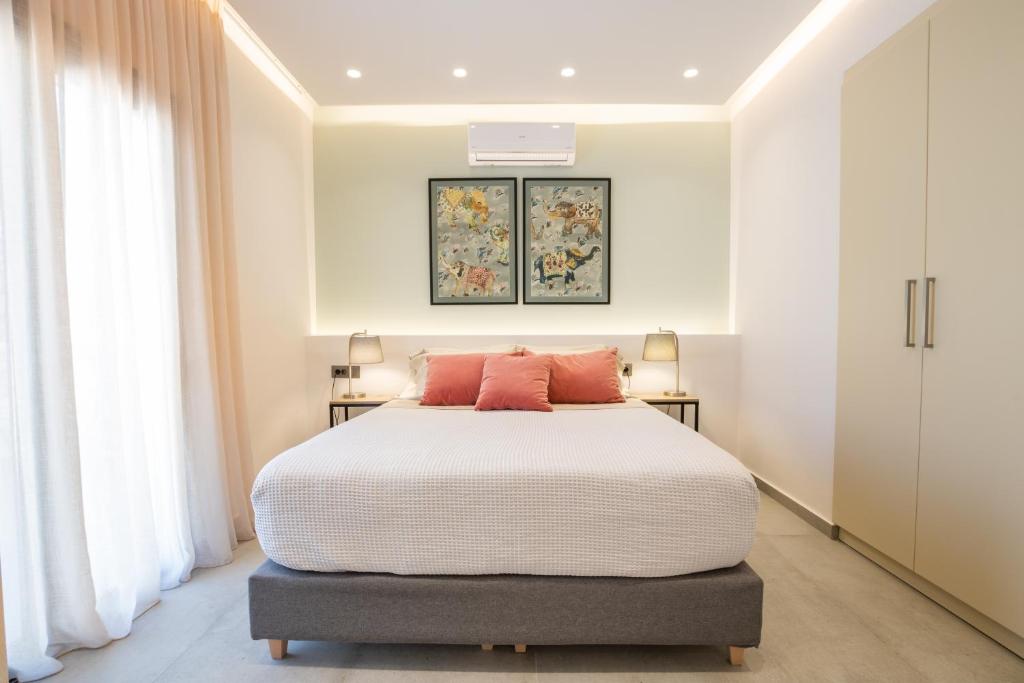 Posteľ alebo postele v izbe v ubytovaní Isanema Villas