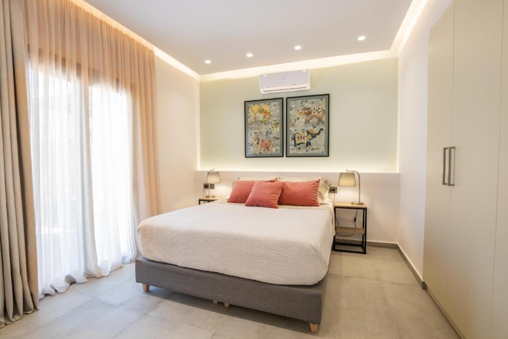 Posteľ alebo postele v izbe v ubytovaní Isanema Villas