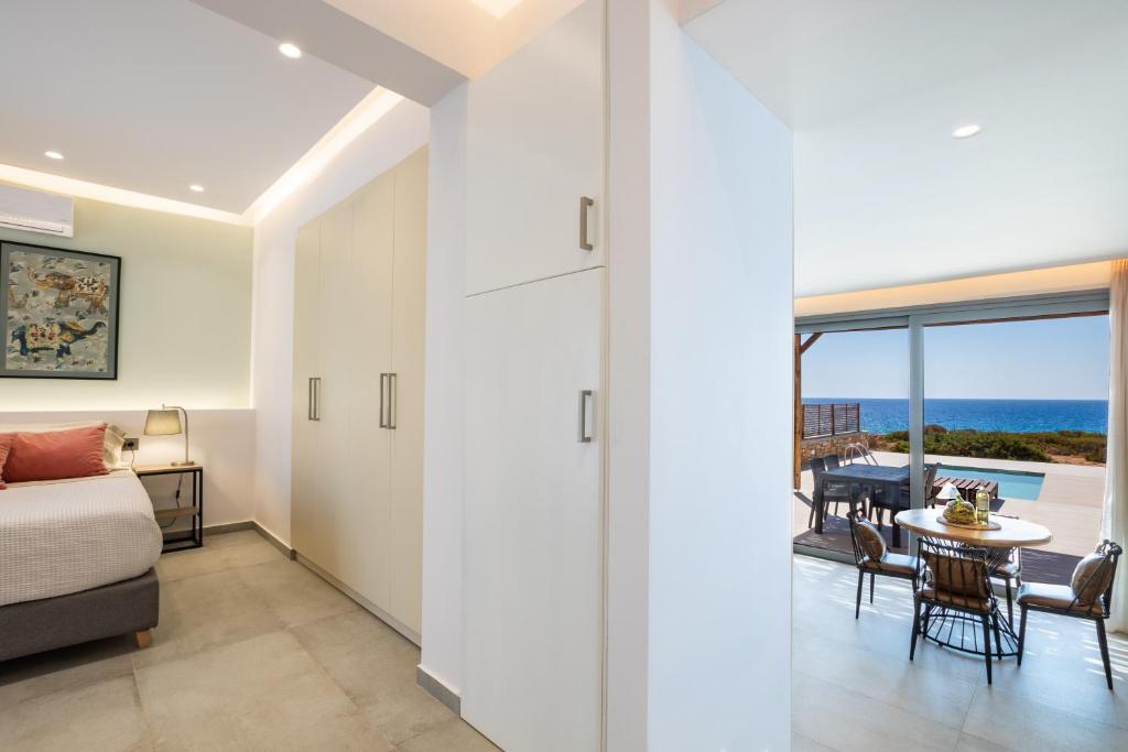 Posteľ alebo postele v izbe v ubytovaní Isanema Villas