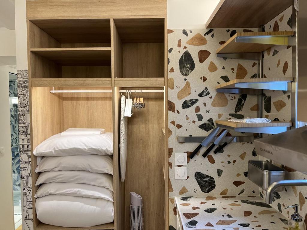 Łóżko lub łóżka piętrowe w pokoju w obiekcie Villette & Canal - Apartment
