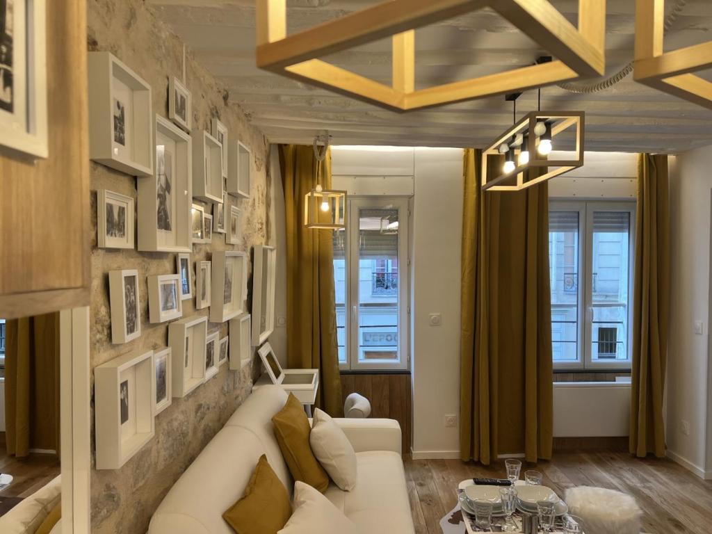 Część wypoczynkowa w obiekcie Villette & Canal - Apartment