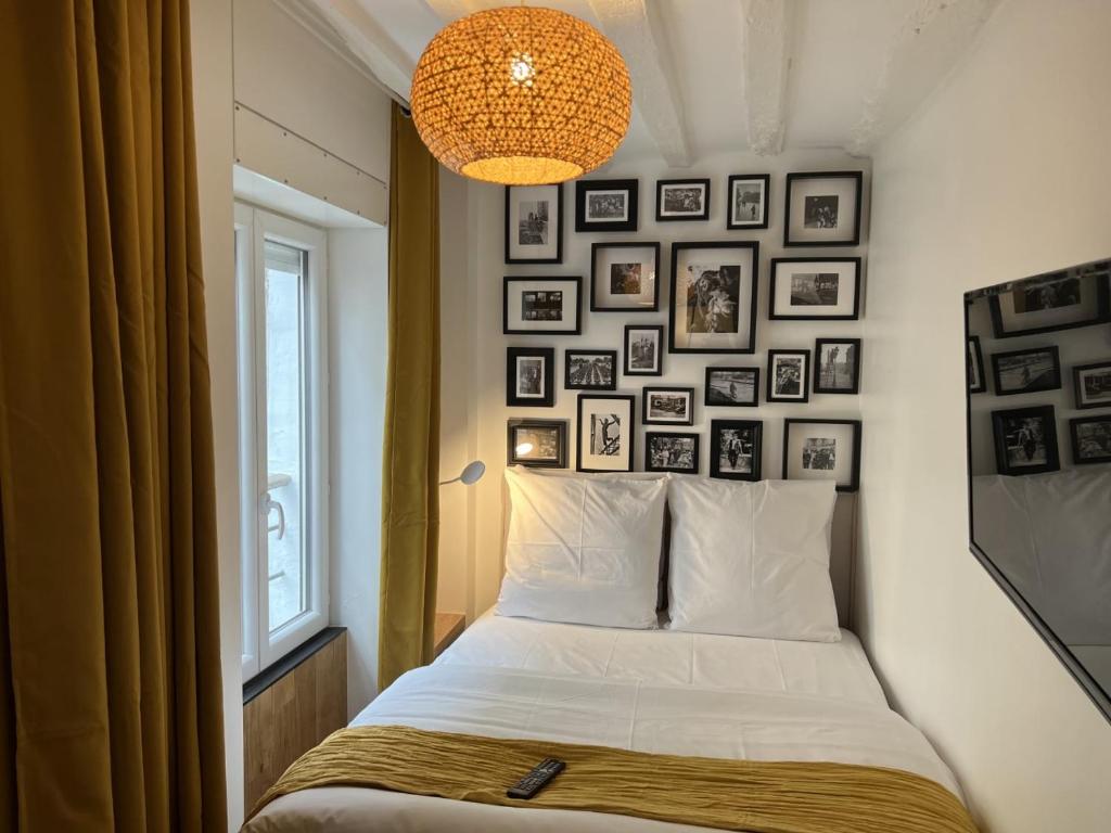 Łóżko lub łóżka w pokoju w obiekcie Villette & Canal - Apartment