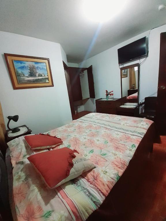 Postel nebo postele na pokoji v ubytování Hotel Central