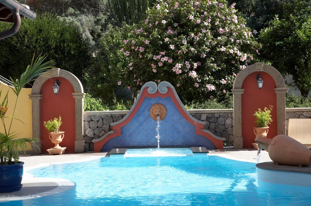 Bazén v ubytování Arciduca Grand Hotel nebo v jeho okolí