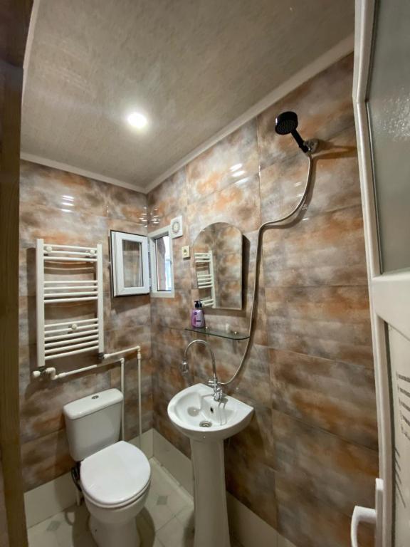 Koupelna v ubytování T Rooms